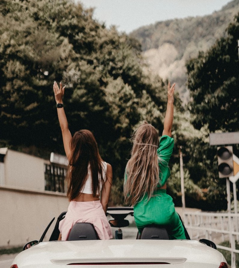 black bicycle with flowers on the window